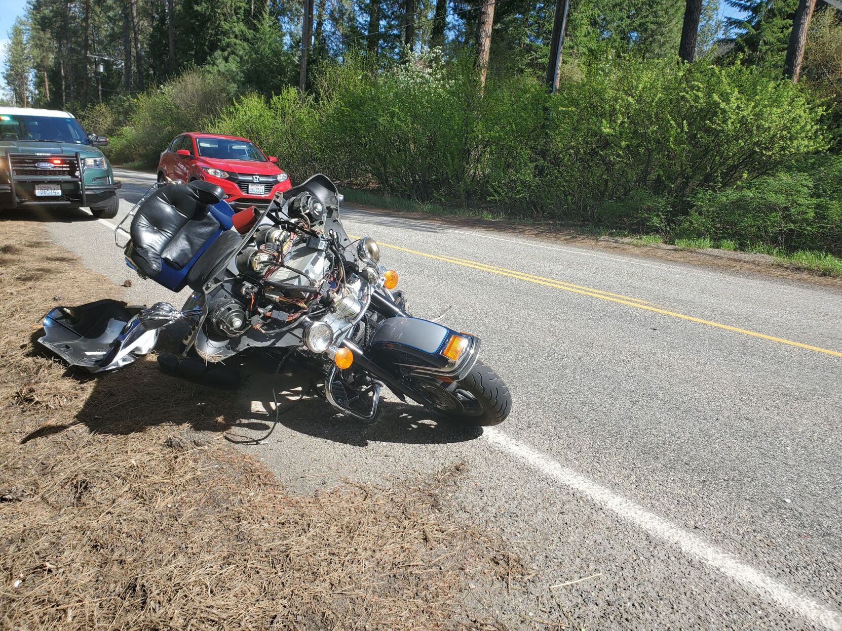 Motorcycle rider in hospital with broken ankle following crash